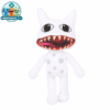 Mimic Mimic plush toy with a wide red toothy grin on a shelf