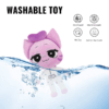 Rumi pink cat plush in a white outfit from Animal Hospital